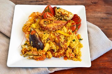 Traditional seafood paella with a variety of selected seafood. Refined and gourmet cuisine
