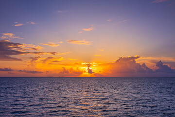 Sunset with sea. Colorful majestic scenery sunset sky with amazing clouds and waves. Beautiful sunset over sea landscape