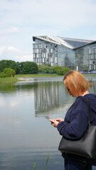 Close-up of a young woman with a phone3