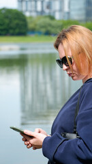 Close-up of a young woman with a phone4