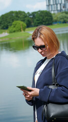 Close-up of a young woman with a phone7