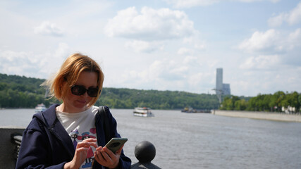 Close-up of a young woman with a phone12