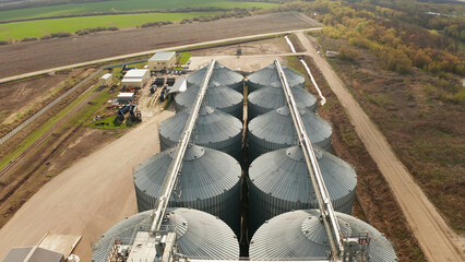 Grain silos storing harvested crops at agricultural facility: aerial view © Ruslan