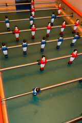 game football detail as table soccer with red and blue white players leisure game concept