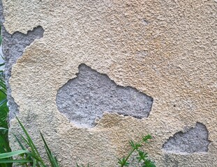 Texture - Old deteriorated brick house facade