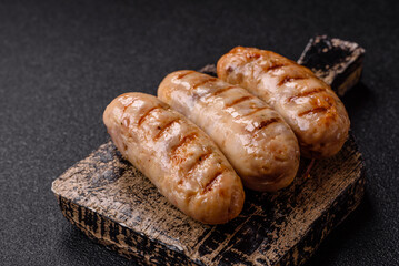 Grilled chicken or beef sausages, a hot meat dish. Barbecued sausages