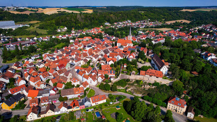 Aerial view around the old town in the city Grünsfeld on an sunny spring day in Germany