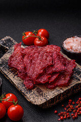 Jerky or dried chicken and cherry snacks. Dehydrated, dried snacks for beer