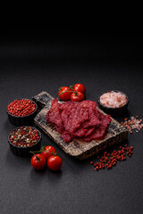 Jerky or dried chicken and cherry snacks. Dehydrated, dried snacks for beer