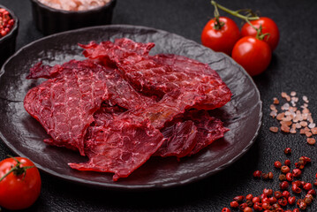 Jerky or dried chicken and cherry snacks. Dehydrated, dried snacks for beer