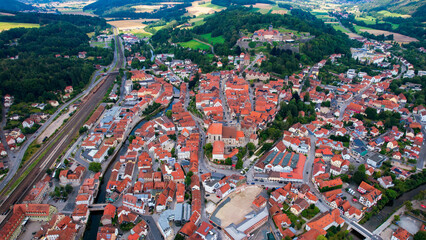 Obraz premium Aerial view around the old town in the city Kronach on an cloudy spring day in Germany