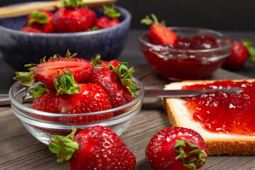 Fresh Strawberries And Jam Toast On Wooden Table