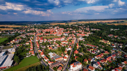 Aerial view around the old town in the city Neustadt an der Orla on an sunny spring afternoon	