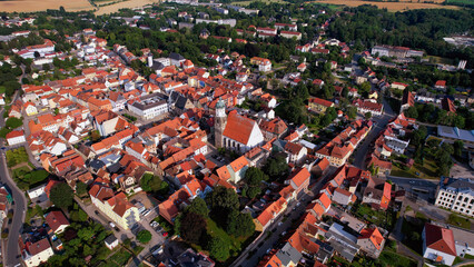 Aerial view around the old town in the city Neustadt an der Orla on an sunny spring afternoon