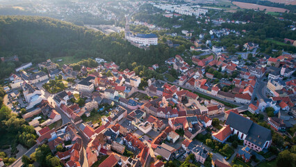 Aerial view around the old town in the city Weida, 07570 on an sunny spring afternoon