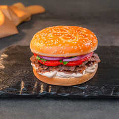 Juicy Beef Shawarma in Bun with Fresh Tomato and Onion
