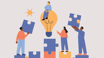 Team Of Five Professionals Brainstorming Around A