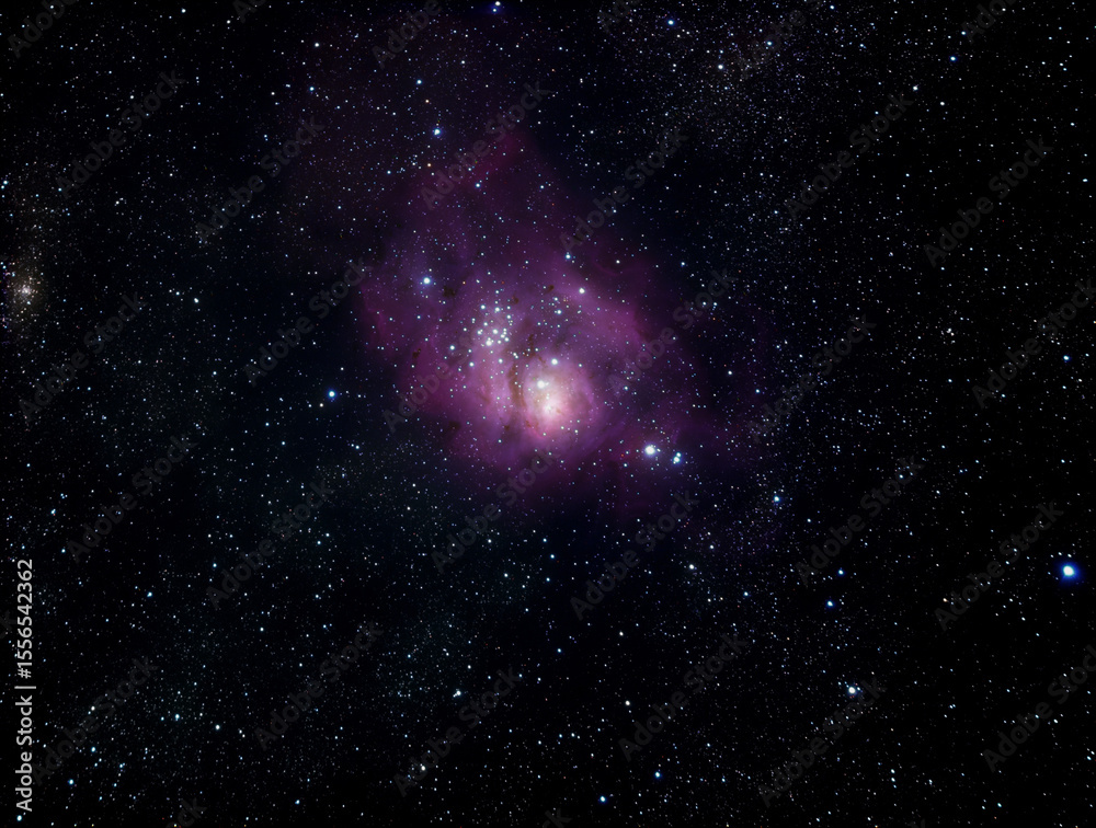 Wall mural a bright colorful nebula in the center of the milky way