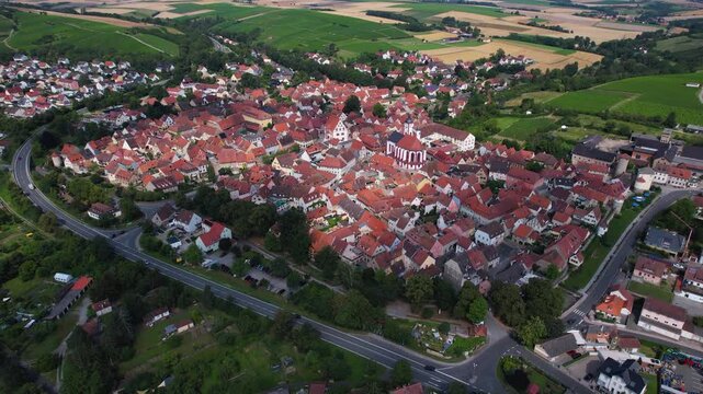 A panoramic aerial view of the city Dettelbach in Germany on a sunny day in spring