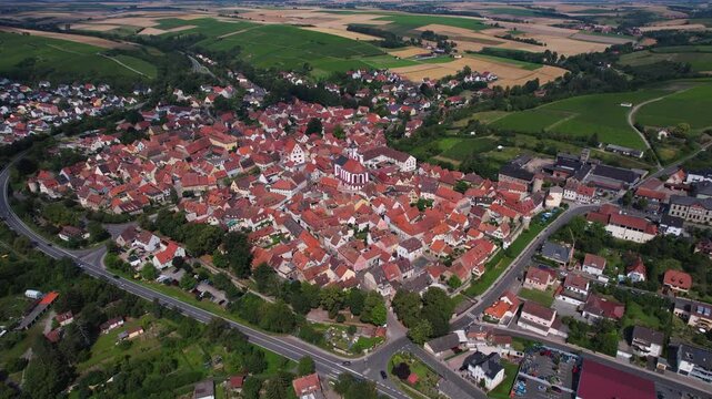 A panoramic aerial view of the city Dettelbach in Germany on a sunny day in spring