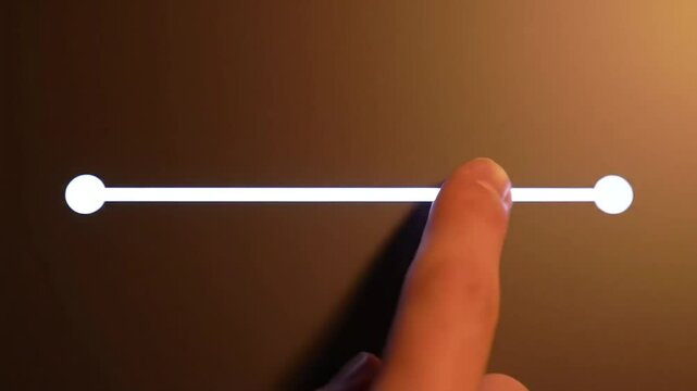 A finger interacts with a glowing, horizontal slider on a dark screen, suggesting interaction with user interface design