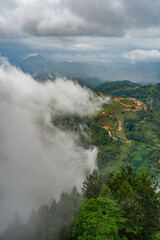 Fototapeta premium Scenic stormy landscape taken form Ambuluwawa Tower, Sri Lanka`s first multi religious center built on top of a solitary mountain near Kandy and Gampola, Sri Lanka, Asia 