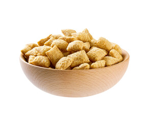 wooden bowl of tasty corn pads isolated on a white background.