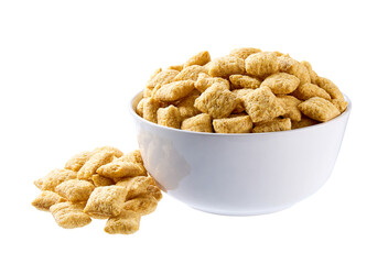 corn pillows pouring out of ceramic bowl isolated on white background.