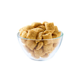 corn pillows in a clear glass bowl isolated on a white background.