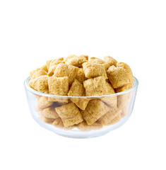 corn pillows in a clear glass bowl isolated on a white background.