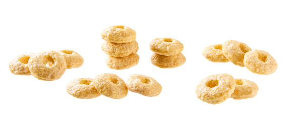 Whole grain cereal rings isolated on white background .