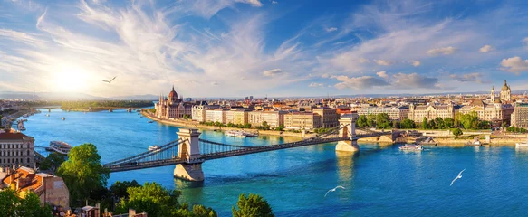 Panoramic view of famous Chain Bridge and Budapest landmark at sunset over Danube river © AlexAnton