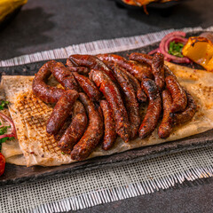 Syrian Sujuk Plate with Tomatoes and Pita Bread