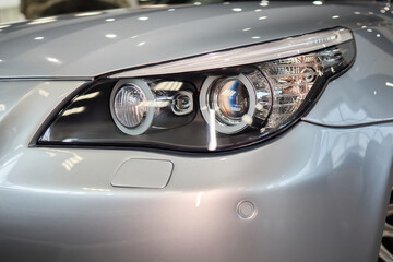 Close up of a cars headlight, part of automotive design