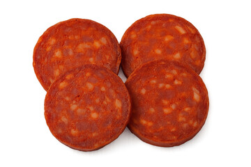 Four overlapping slices of chorizo with visible paprika and fat against a transparent background