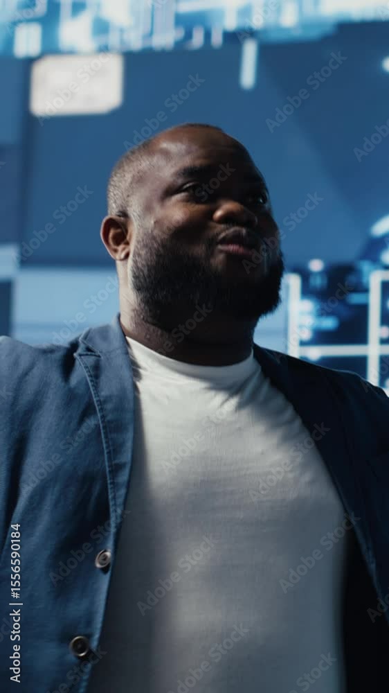 Poster vertical video african american guy reviews smart tech ai systems to interact with cybernetic platfo