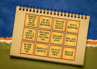 Invest time in yourself - a set of inspirational reminder notes with tips and guidelines in a spiral notebook