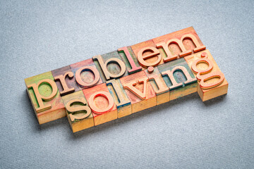 problem solving - words in vintage letterpress wood type, education, science and business concept
