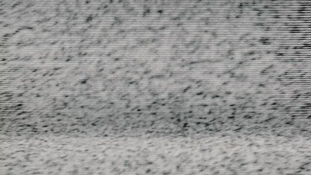 Part of a 20-clip analog static collection filmed from a real 70s Bimex-1000 TV. See other clips in this series for matching textures. Ideal for retro video textures, music videos, and motion design.