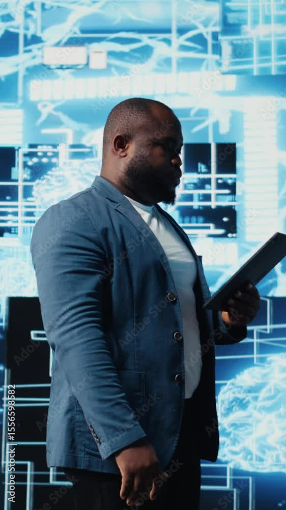 Poster vertical video young black technician reviewing ai data visualization and neural networks platforms,
