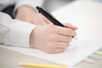 Studying during school or cram school classes Image of a serious and earnest examination,without...