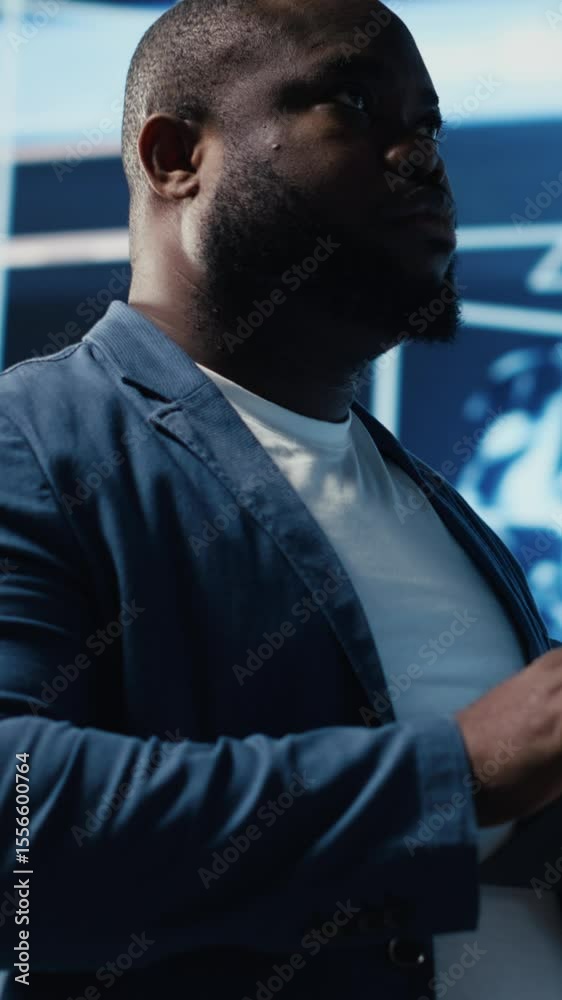Poster vertical video african american it specialist ensuring futuristic ai brain in the background, machin