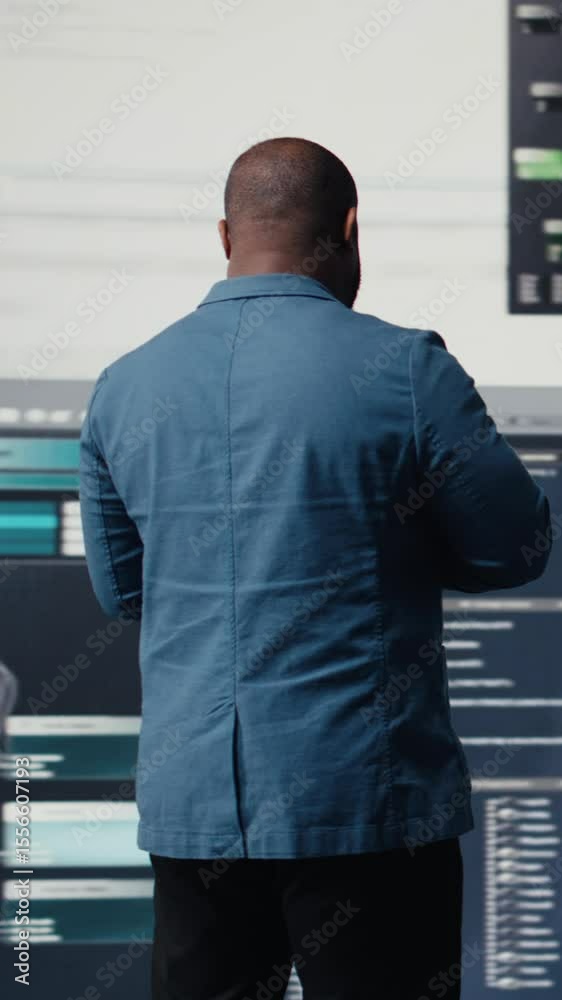 Poster vertical video african american coder expert immersing in software development for a high tech work 