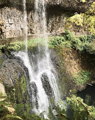 Double-Tiered Waterfall on Rocky Cliff