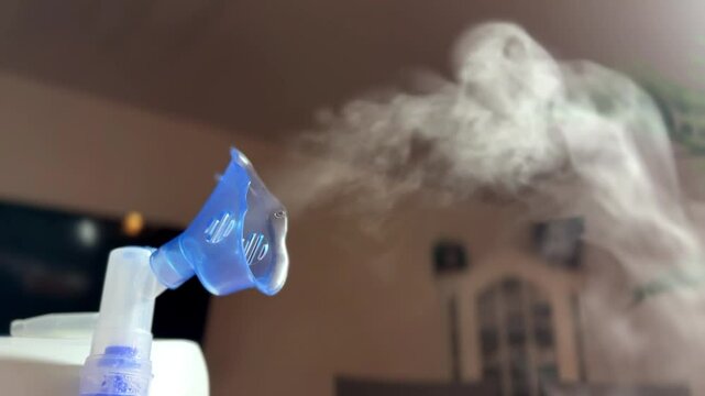 Nebulizer nebulizes medicine, home treatment, flu and bronchitis