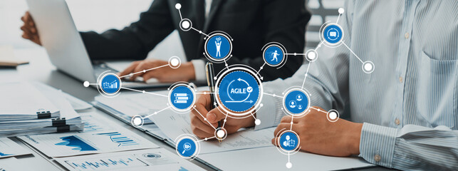 Explore a modern office scene illustrating collaboration and agile methodology, showcasing teamwork...