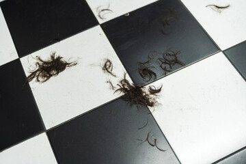 Hair remnants on the floor after a recent haircut in a stylish salon