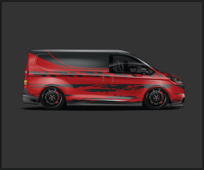 Slammed Red Van with Custom Graphics and Black Wheels on Gray Background