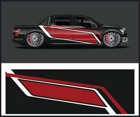 Slammed Black Pickup Truck with Red and White Graphic Wrap Design © MdAbdullah