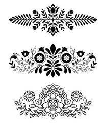 Three decorative black floral ornaments isolated on white background